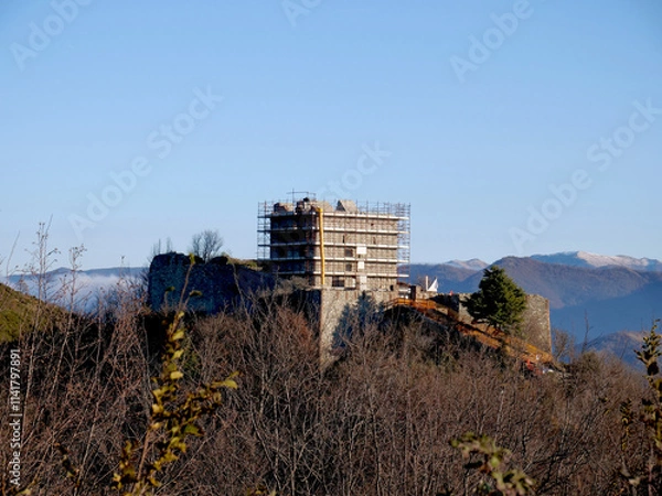 Fototapeta Historic fortifications of the city of Genoa, Italy. In the picture, the Fort Puin under renovation surrounded by scaffolding. 