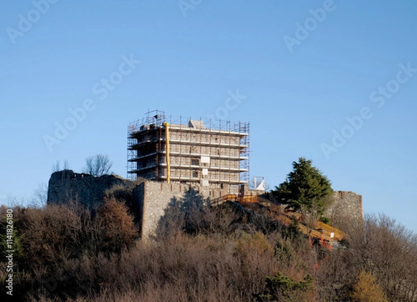 Fototapeta Historic fortifications of the city of Genoa, Italy. In the picture, the Fort Puin under renovation surrounded by scaffolding. 