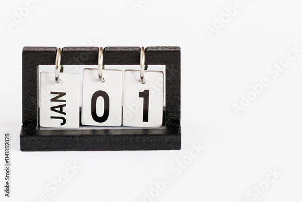 Fototapeta A perpetual desktop calendar on a white background. New Year. January 1st.