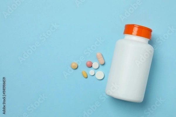 Fototapeta Various pills with bottle on colorful background