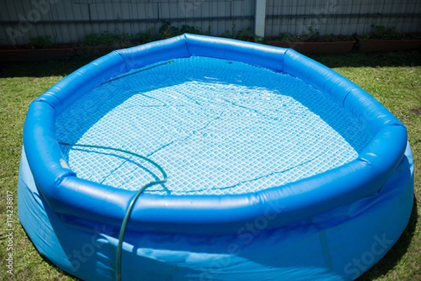 Fototapeta Plastic pool in a summer day