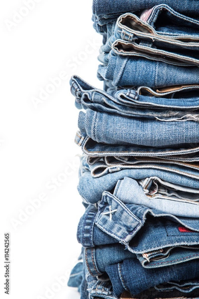 Obraz stack of jeans on white background