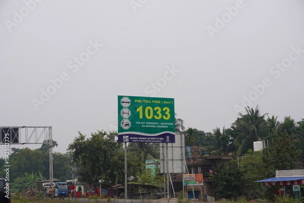 Fototapeta Toll free number board for Pedestrian safety in roadside