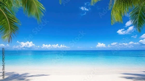 Fototapeta A beautiful blue ocean with palm trees in the background