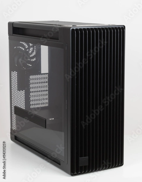 Fototapeta Side view of empty  big tower, PC case, chassis,  tempered-glass left panel has a mesh window to aid in graphics-card ventilation