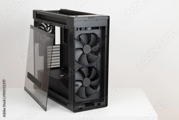 Fototapeta Side view of empty  big tower, PC case, chassis, removable tempered-glass left panel, two extra-thick 200 x 38 mm front fans for maximum air intake