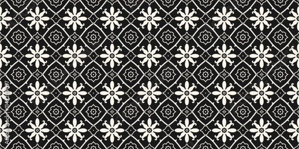 Fototapeta Vector floral seamless pattern with ethnic folk motifs. Simple black and white abstract geometric ornament texture with small flowers, repeat tiles. Elegant monochrome background. Repeated geo design