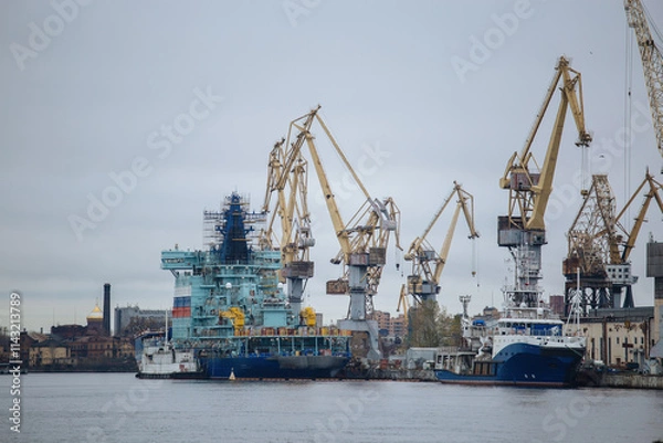 Obraz Construction of new ship and cranes