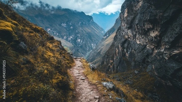 Obraz Narrow Trail Overlooking Deep Mountain Valley