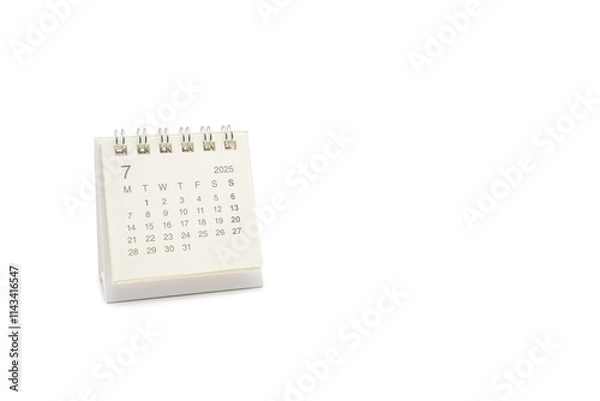 Fototapeta Simple desk calendar for JULY 2025 isolated on white background. Calendar concept with copy space. 2025 JUL calendar.