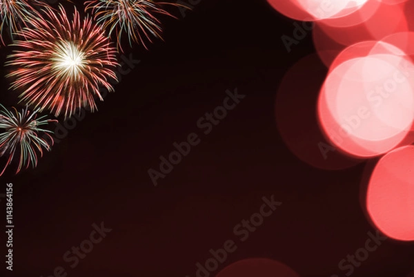 Obraz Red firework and blurred bokeh light with copy space in Christmas and New Year. Abstract background holiday concept.