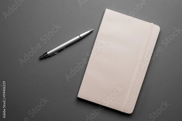 Fototapeta A notebook and pen