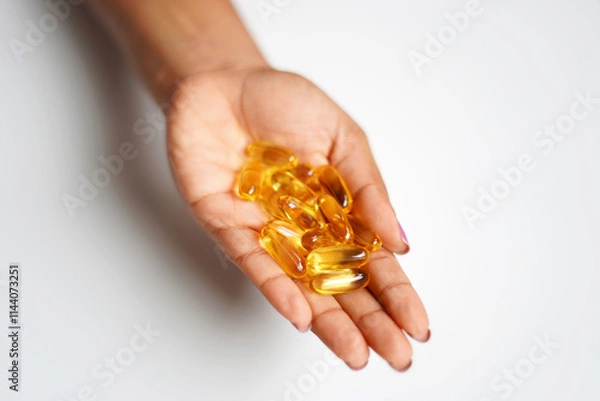 Obraz omega 3 capsules on hand image. closeup
