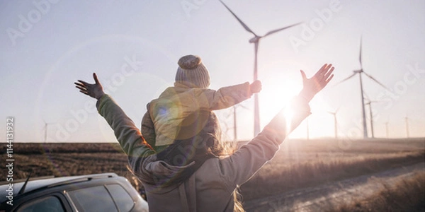 Obraz Technology and Sustainable Energy Innovation Concept of Renewable Energy from Wind. Pride, Green, Clean Energy, child, mother, nature, Wind Energy, Eco friendly, Environment