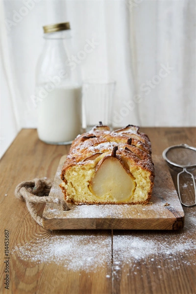 Fototapeta Cake with pears on a wooden table 
