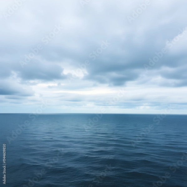 Fototapeta View of calm sea against cloudy sky