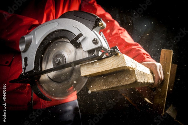 Obraz Carpenter with Circular Saw