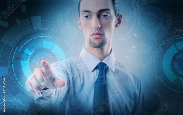 Fototapeta Businessman pressing virtual buttons in futuristic concept