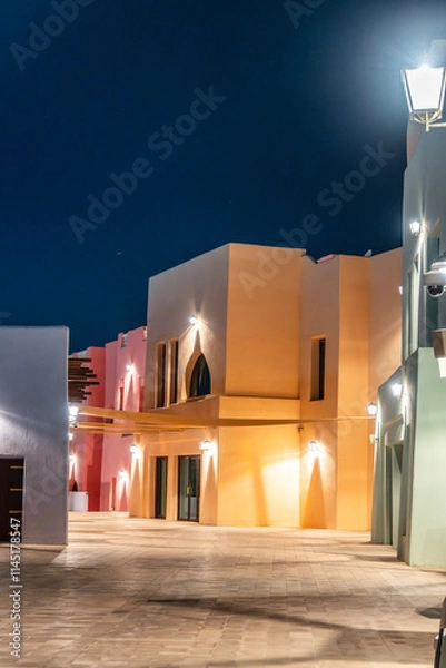 Obraz Colorful small houses and shops in the old port area in Doha, Qatar