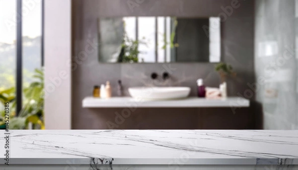 Fototapeta Empty white marble table in front of blurred bathroom interior
