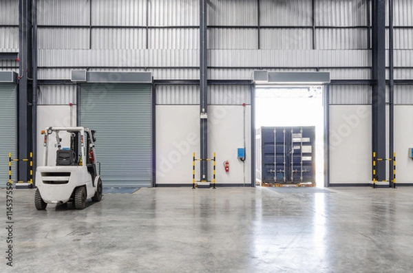 Fototapeta Forklift and contianer in the warehouse