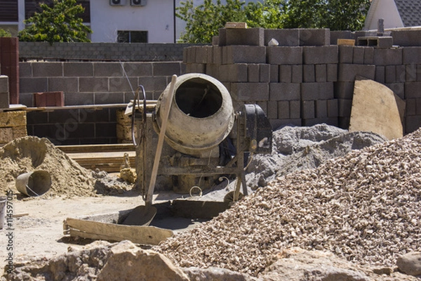 Obraz cement mixer at a construction site