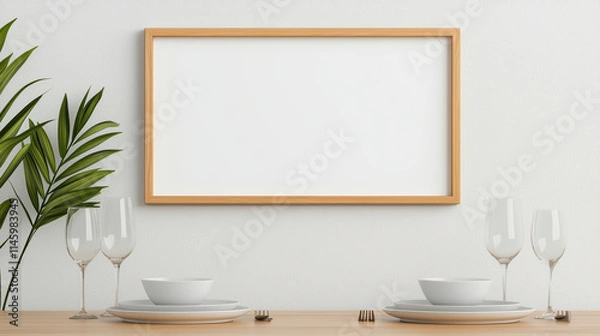 Fototapeta minimalist dining setup featuring empty wooden frame above table with elegant dishware and greenery, creating serene atmosphere