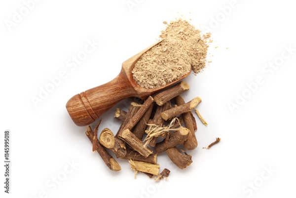Obraz A wooden scoop filled with organic Liquorice or Mulethi (Glycyrrhiza glabra) powder, placed beside a heap of liquorice roots, isolated on a white background.