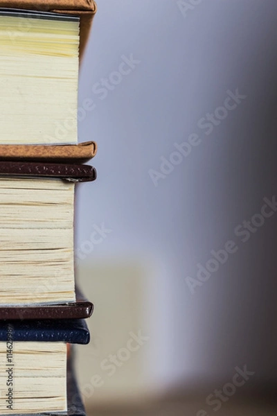 Fototapeta a stack of books  shallow depth of field