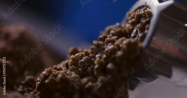 Fototapeta Grinding process close-up