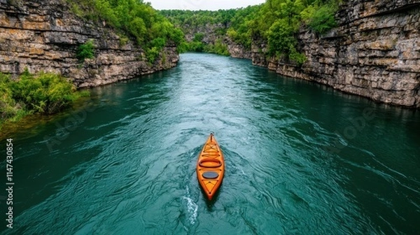Obraz Scenic Kayaking Adventure in Lush Green Canyon with Calm Waters