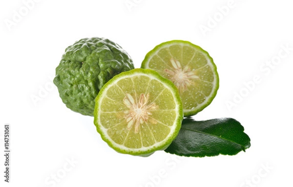 Fototapeta whole and half cut Bergamot with lime leaf on the white backgrou