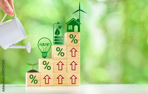 Fototapeta Nurturing Sustainability: Investing in renewable energy and energy-efficient practices leads to significant savings and environmental benefits. A hand holding a watering can nurturing a small plant.