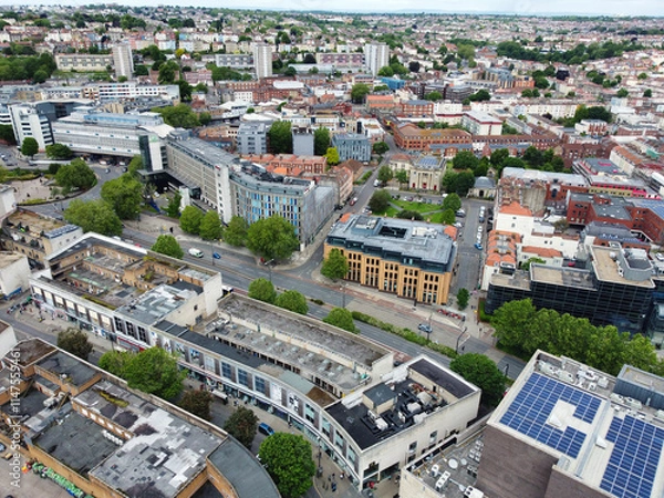 Fototapeta An Aerial View of Buildings at Central Bristol City of Southwest of England, United Kingdom. May 26th, 2024. The High Angle Footage Was Captured with Drone's Camera from Medium High Altitude.