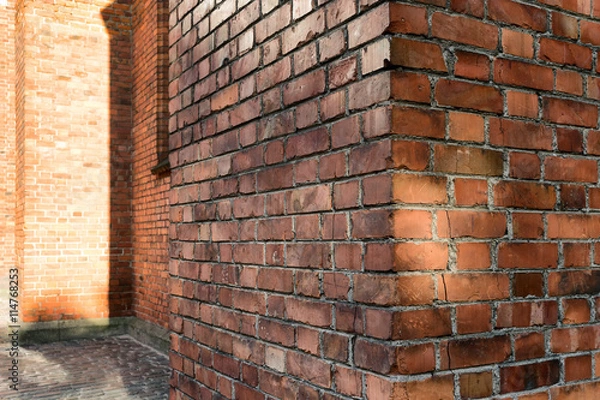 Fototapeta The angle of the old house from a red brick