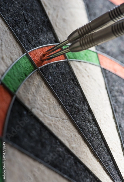 Fototapeta Darts in a dartboard, hit the maximum score 180