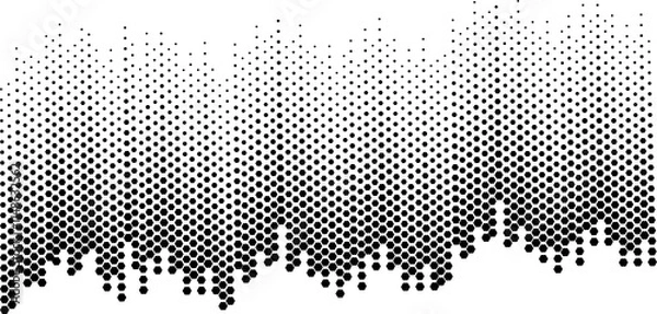 Fototapeta An abstract black and white wavy halftone background.
