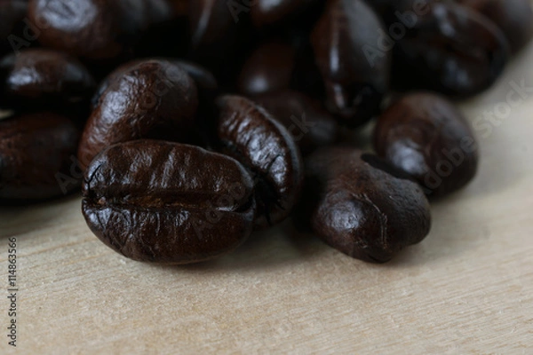 Obraz Coffee beans on wood background