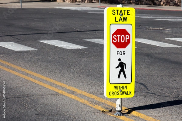 Fototapeta Stop for Pedestrians within crosswalk sign and crosswalk