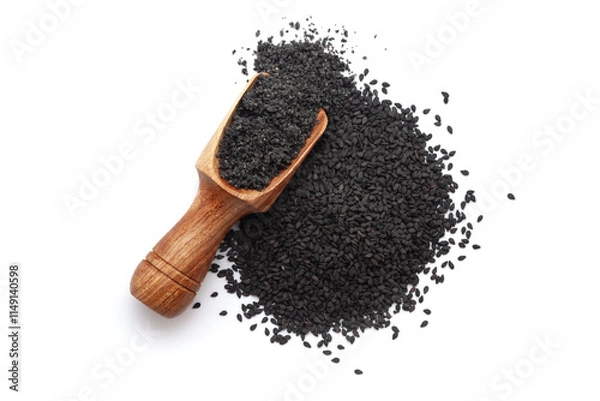 Obraz A wooden scoop filled with organic Black Sesame (Sesamum indicum) Seeds powder, placed beside a heap of black sesame seeds, isolated on a white background.