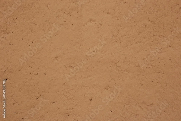 Fototapeta wall of home made from mud or adobe house. Clay wall texture of House structure.Selective focus