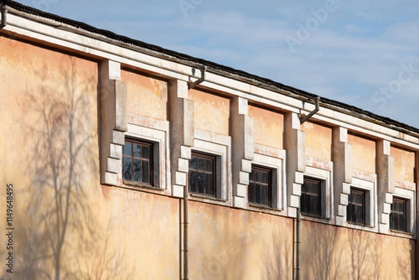 Fototapeta design and architectural solution of an apartment building, windows, facade, roof. light and shadow