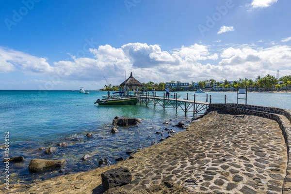 Fototapeta Mauritius beach thatch jetty. Tropical Mauritius island water & beach resort, Turtle Bay - Balaclava