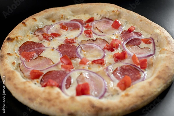 Fototapeta details of the pizza application; juicy pizza from the oven with mushrooms, tomatoes and bacon and sprinkled with parmesan cheese