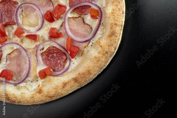 Fototapeta details of the pizza application; juicy pizza from the oven with mushrooms, tomatoes and bacon and sprinkled with parmesan cheese