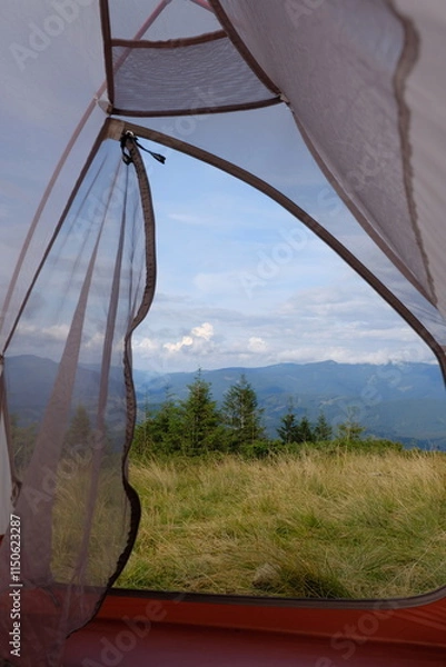 Fototapeta View of the mountain landscape from the tent.