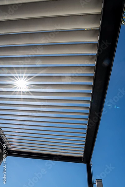 Obraz Trendy outdoor patio pergola shade structure, awning and patio roof.