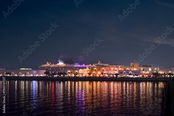 Obraz Colorful houses at night in the Old Port area of ​​Doha, Qatar