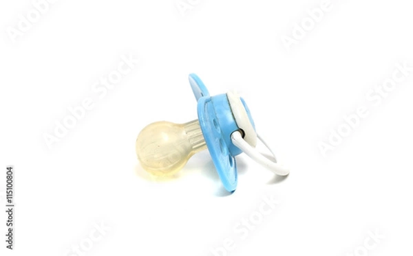 Obraz little blue pacifier on a white background