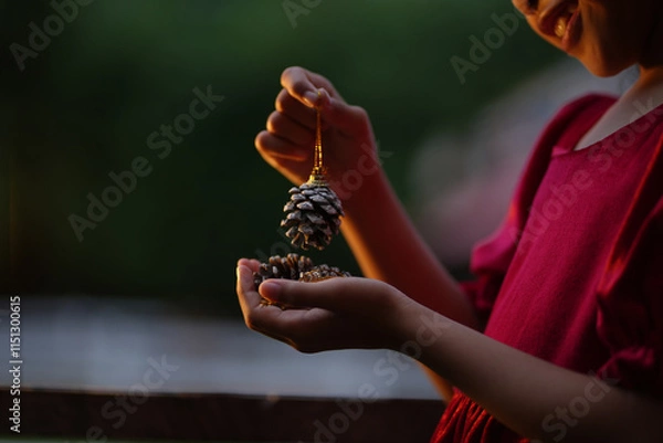 Obraz A little girl is happy to join the christmas day.